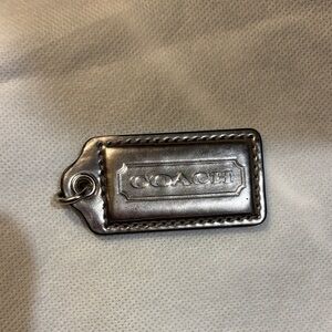 Coach Metallic Silver tag charm